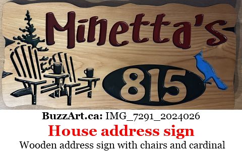Wooden address sign with chairs and cardinal